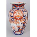 A 19TH CENTURY JAPANESE IMARI FLUTED PORCELAIN VASE, 12.4in high.