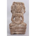 A Khmer Style Sandstone Figure of Buddha Seated under Mucalinda, seated in sattvasana on the