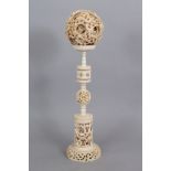 A GOOD LARGE EARLY 20TH CENTURY CHINESE CONCENTRIC SECTIONAL IVORY BALL ON STAND, weighing approx.