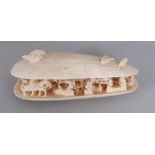 AN EARLY 20TH CENTURY CHINESE CARVED IVORY MODEL OF THE CLAM’S DREAM, 3in wide at widest point & 1.