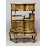 AN UNUSUAL FINE QUALITY JAPANESE MEIJI PERIOD SHODANA GOLD LACQUERED DISPLAY CABINET, decorated in a