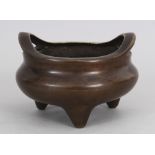 A GOOD CHINESE BRONZE TRIPOD CENSER, possibly early,