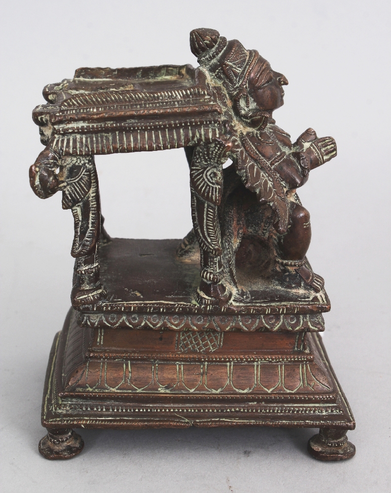 A Bronze Base from a Vishnu Shrine, Tamil Nadu, South India, 19th century, depicting a crouching - Image 2 of 6