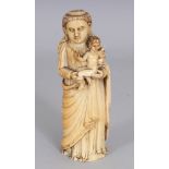 A GOOD 18TH CENTURY GOANESE IVORY CARVING OF THE VIRGIN MARY, standing in flowing robes and