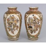 A PAIR OF GOOD QUALITY SIGNED JAPANESE MEIJI PERIOD SATSUMA EARTHENWARE VASES, each painted with