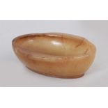 A GOOD QUALITY SMALL AGATE-LIKE JADE LIBATION BOWL, with flanged handles, 3in x 2.3in.