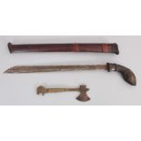 A Javanese Kris, Indonesia, 19th century, with crescent-shaped horn hilt, gently flared blade with