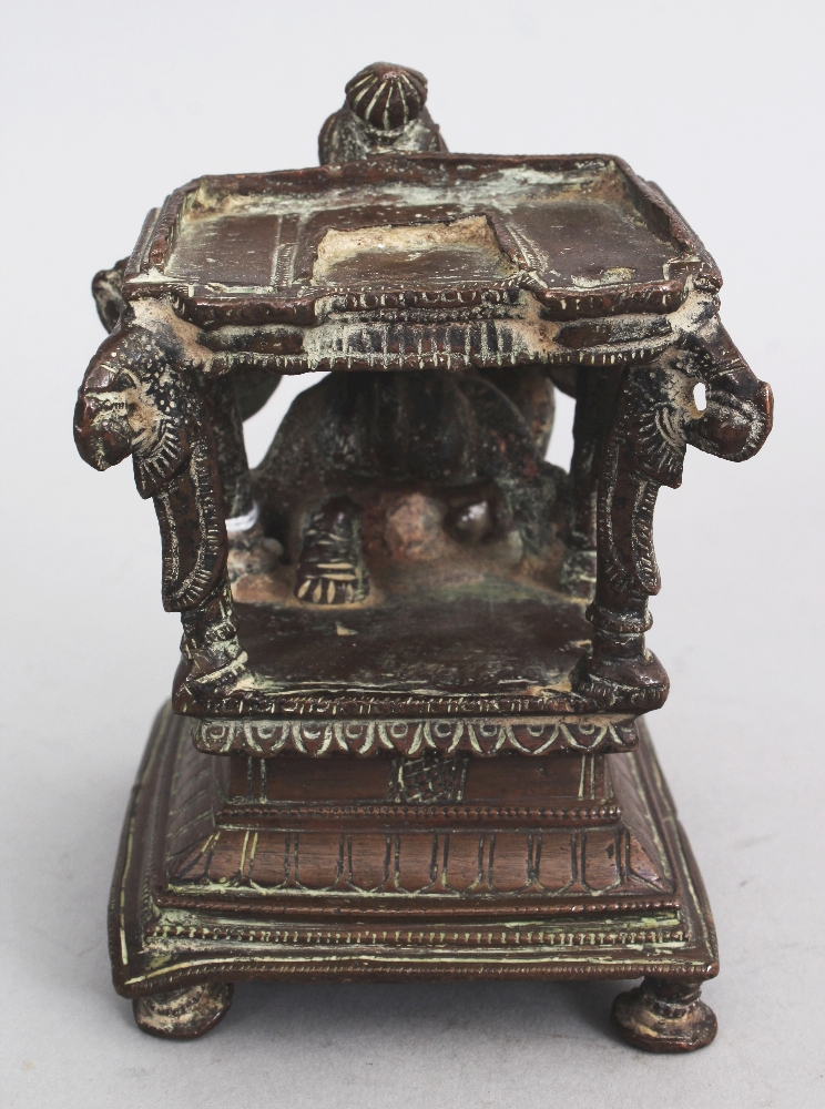 A Bronze Base from a Vishnu Shrine, Tamil Nadu, South India, 19th century, depicting a crouching - Image 3 of 6