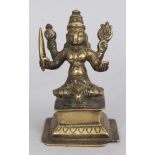 A Brass Figure of Durga, Western Deccan, India, circa 18th century, seated on a raised plinth, the