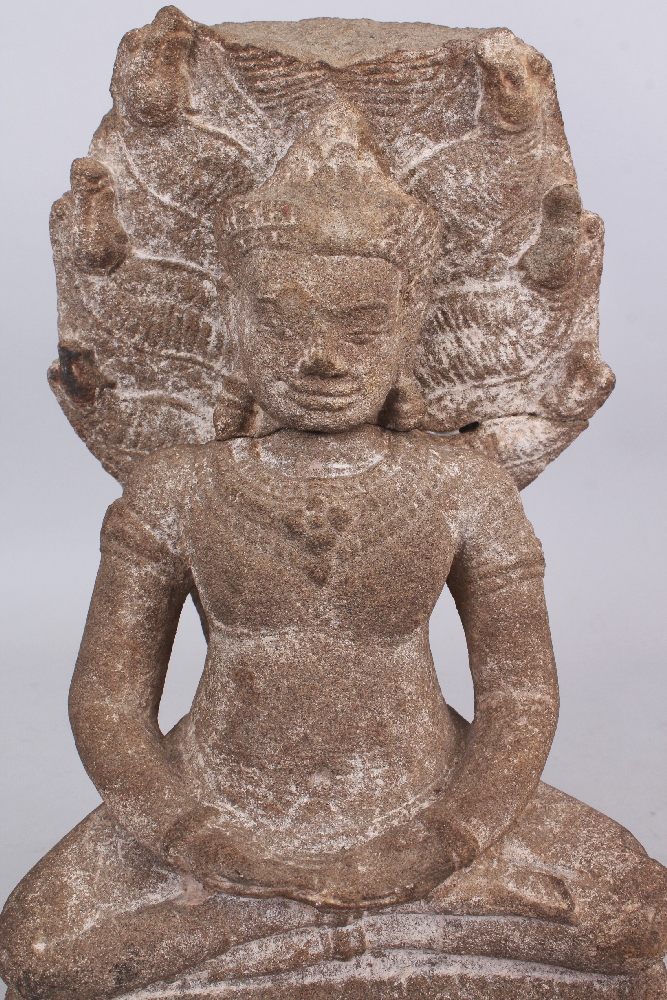 A Khmer Style Sandstone Figure of Buddha Seated under Mucalinda, seated in sattvasana on the - Image 5 of 6