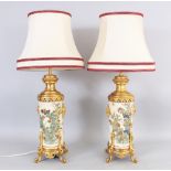 A PAIR OF EARLY 20TH CENTURY JAPANESE SATSUMA STYLE EARTHENWARE VASES, mounted as lamps with gilt