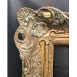 20th Century English School. A Gilt Composition Frame, with Swept and Pierced Centres and Corners,