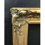 20th Century English School. A Gilt Composition Frame, with Swept and Pierced Centres and Corners,