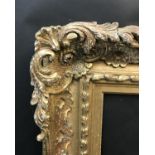 20th Century English School. A Gilt Composition Frame, with Swept and Pierced Centres and Corners,