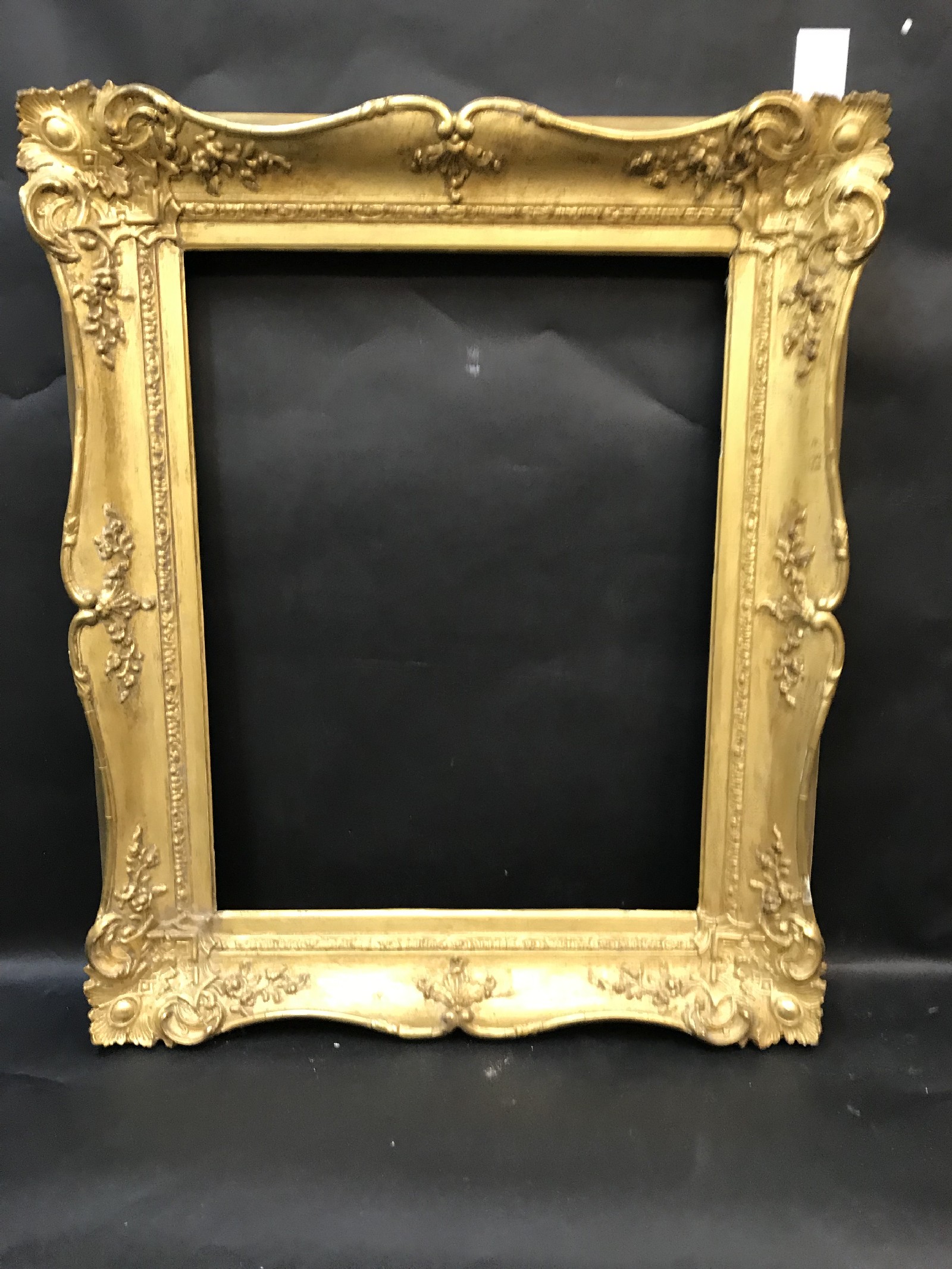 19th Century English School. A Gilt Composition Swept Frame, 20.25" x 15.5" (rebate). - Image 2 of 3