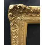 20th Century English School. A Gilt Composition Frame, with Swept Centres and Corners, 28" x 14" (