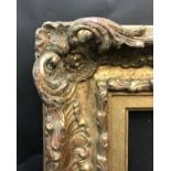 20th Century English School. A Gilt Composition Frame, with Swept and Pierced Centres and Corners,