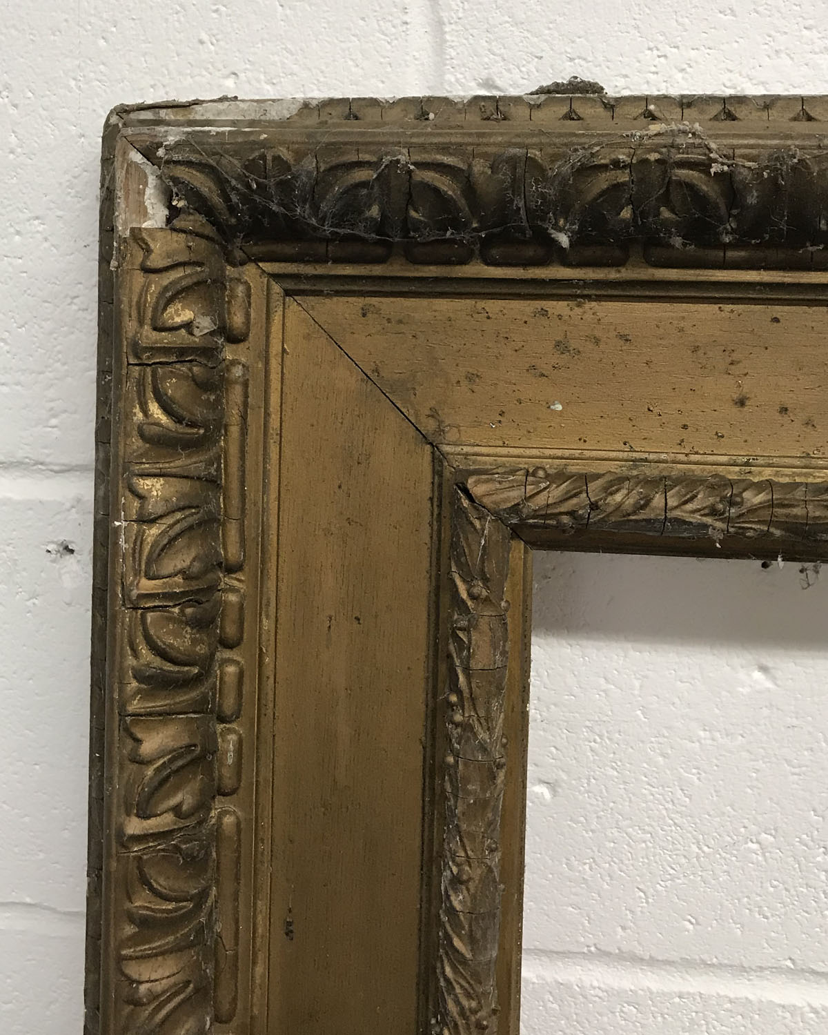 19th Century English School. A Watts Style Gilt Composition Frame, 74.5" x 50.5" (rebate).