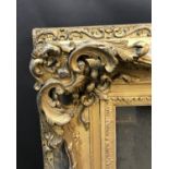 19th Century English School. A Gilt Composition Frame, with Swept and Pierced Centres and Corners,