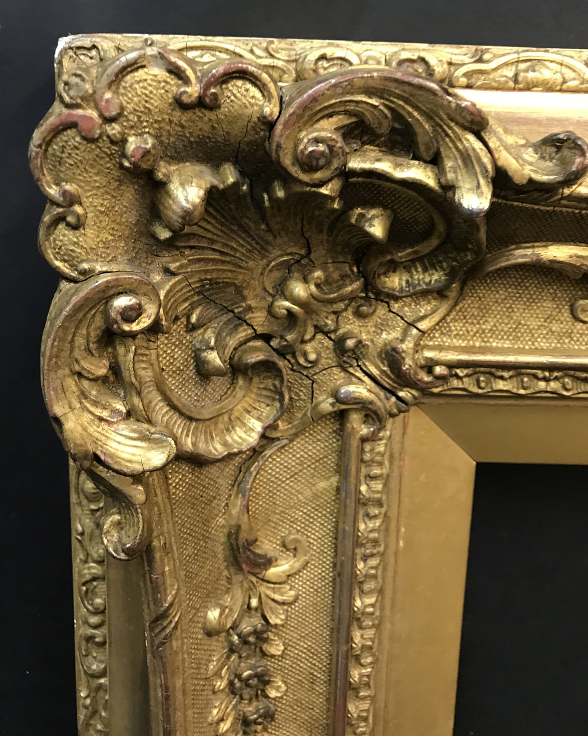 19th Century English School. A Gilt Swept Centres and Corners Composition Frame, 24" x 20" (