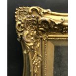 19th Century English School. A Gilt Composition Frame, with Swept Centres and Corners, and inset