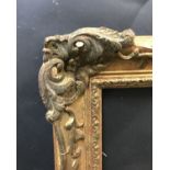 20th Century English School. A Gilt Composition Frame, with Swept and Pierced Centres and Corners,