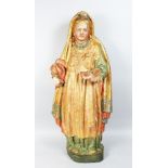 A LARGE 18TH CENTURY ITALIAN CARVED WOOD, PAINTED AND GILDED FIGURE OF A WOMAN holding an open book.