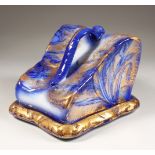 A BLUE AND GILT CHEESE DISH AND COVER.