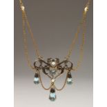 A 9CT GOLD, BLUE TOPAZ AND DIAMOND PENDANT AND CHAIN.