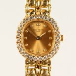 A LADIES SUPERB PATEK PHILIPPE 18CT GOLD AND DIAMOND WRISTWATCH. Original cost over £20,000.