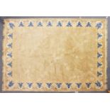 A CHINESE CARPET, beige ground, with a border decorated with a stylised design. 11ft 8ins x 8ft