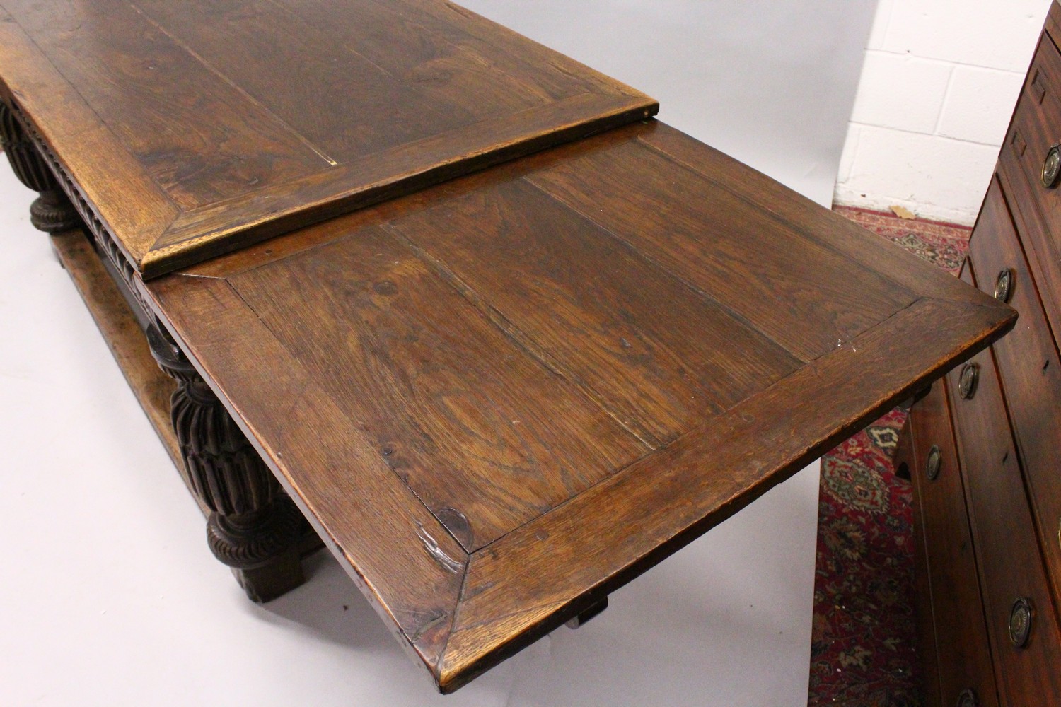 A GOOD 17TH/18TH CENTURY OAK DRAW LEAF TABLE, with a plain rectangular top, carved frieze on four - Image 7 of 9