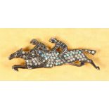 A 9CT GOLD AND SILVER, OPAL AND DIAMOND DOUBLE JOCKEY BROOCH.