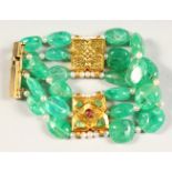 A SUPERB THREE-ROW EMERALD BEAD BRACELET, with interspaced seed pearls, with 18ct gold square