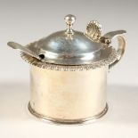 A HEAVY VICTORIAN CIRCULAR MUSTARD POT AND COVER, gadrooned edge with blue glass liner. 2.5ins