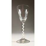 A LARGE GEORGIAN WINE GLASS, with cable twist stem, a plain bowl. 6.5ins high.