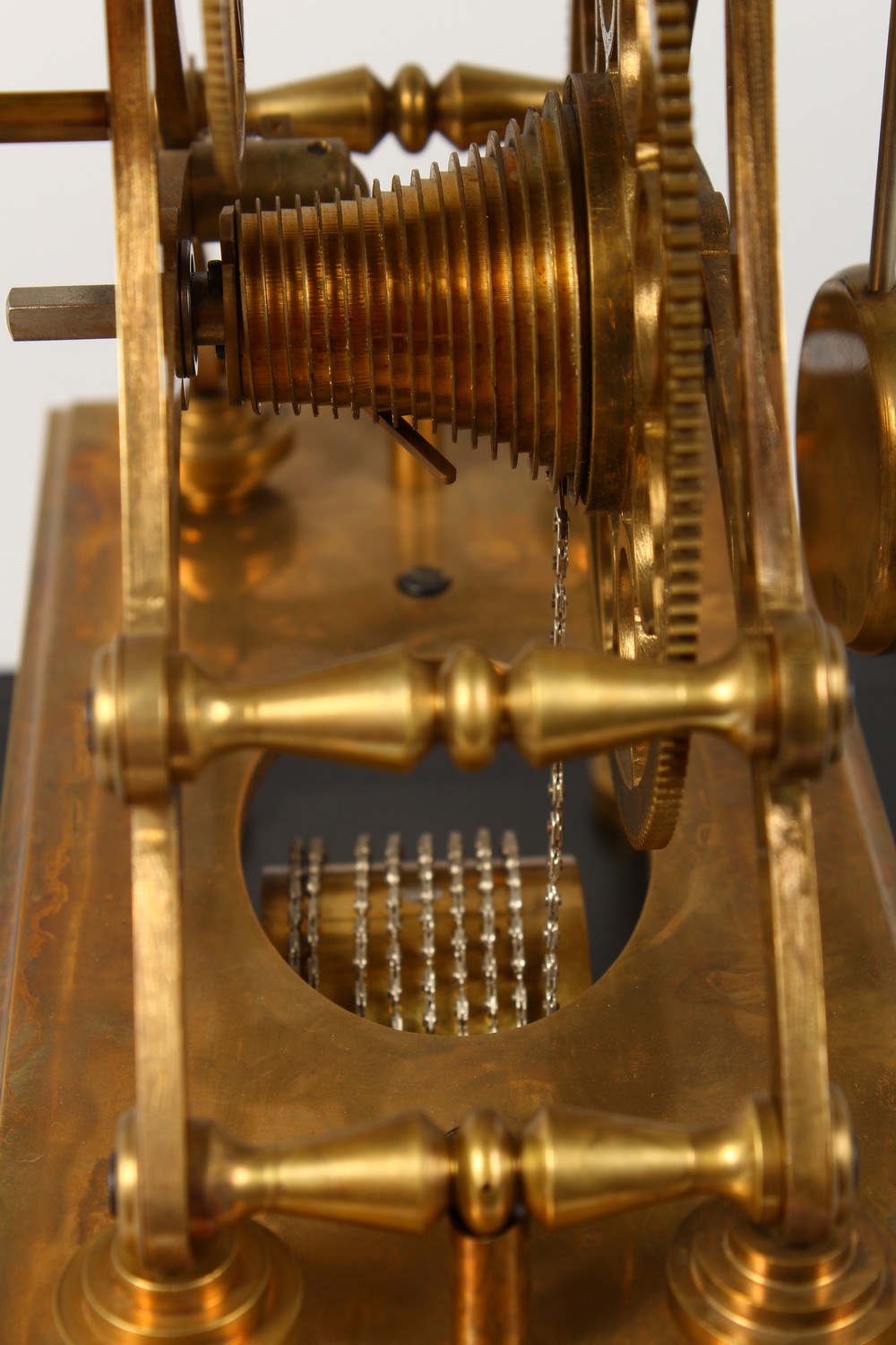 A MOON PHASE SKELETON CLOCK in a glass case. 17.5ins high including case. - Image 5 of 10