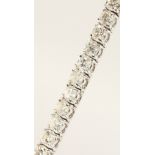 A 14CT YELLOW GOLD DIAMOND BRACELET, made of 7.5cts.