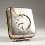 A TRAVELLING WATCH in a silver and leather case. Engraved M. J. COBB, from LORD NORTH 1872-1922,