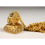 A HEAVY GOLD PLATED LION SEAL ON CHAIN.