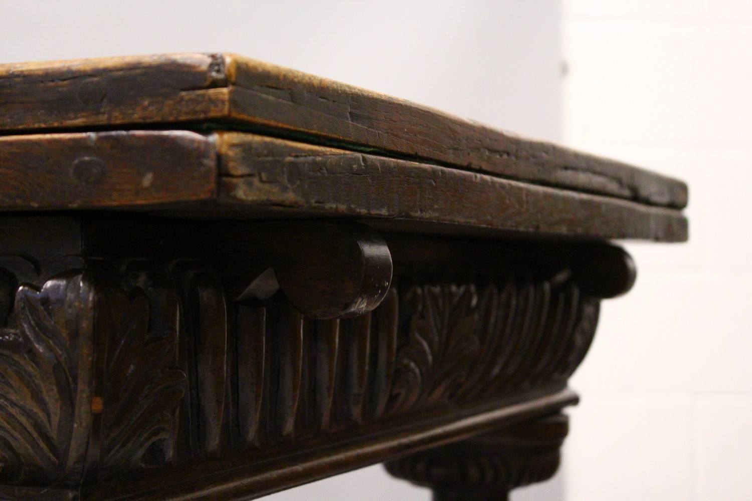 A GOOD 17TH/18TH CENTURY OAK DRAW LEAF TABLE, with a plain rectangular top, carved frieze on four - Image 5 of 9