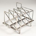 A VICTORIAN FOUR DIVISION TOAST RACK. 4.75ins long. London 1882.