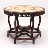 A 19TH CENTURY HONGMU AND MOTHER-OF-PEARL INLAID CENTRE TABLE, QING DYNASTY, the circular top with