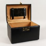 A GOOD LEATHER TRAVELLING JEWELLERY CASE.