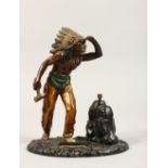AN AUSTRIAN PAINTED METAL FIGURE OF A RED INDIAN LOOKOUT, as a lighter. 8ins high.