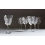 A SET OF TEN WATERFORD HOBNAIL CUT SMALLER WINE GLASSES.