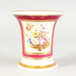 A ROCKINGHAM PORCELAIN VASE, painted with a panel of flowers in a gilded border. Red Griffin mark.