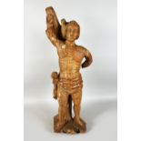 A 17TH-18TH CENTURY CARVED WOOD FIGURE STANDING BEFORE A TREE. 3ft 2ins high.