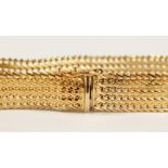 A 9CT GOLD BRACELET, 10gms.