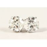 A PAIR OF 18CT WHITE GOLD DIAMOND STUDS of 2.2cts.